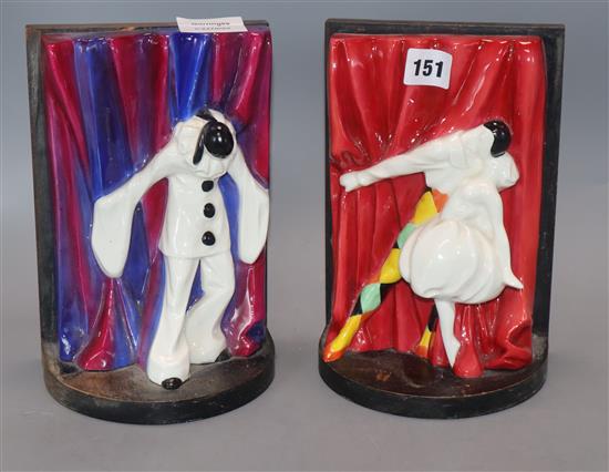 A pair of Royal Worcester Pierrot and Harlequin and Columbine bookends, designed by Doris Lindner in 1931, discontinued in 1940